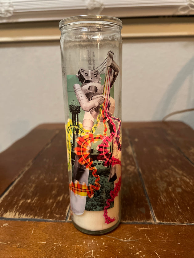 “Big D Energy” prayer candle by Amy & Andrew Sherman $20